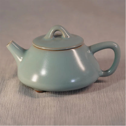 Close-up of bridge finial lid and celestial blue crackle glaze on handcrafted Ru Ware Shipiao teapot