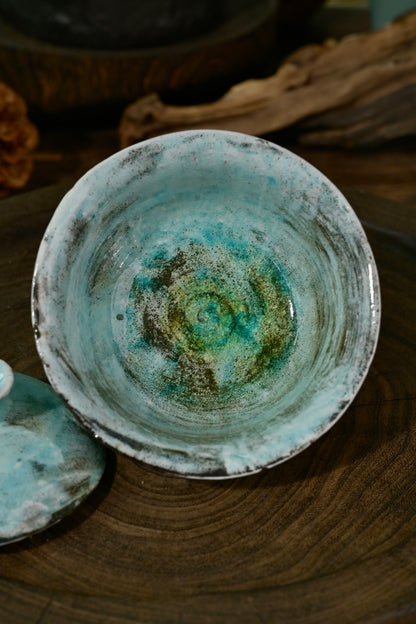Close-up of natural flame flashing and soda glaze texture on 100ml blue Kohiki gaiwan