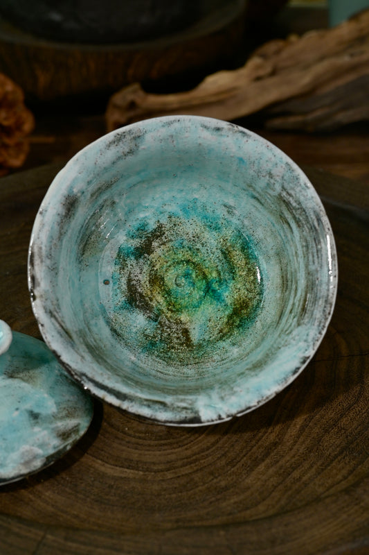 Close-up of natural flame flashing and soda glaze texture on 100ml blue Kohiki gaiwan