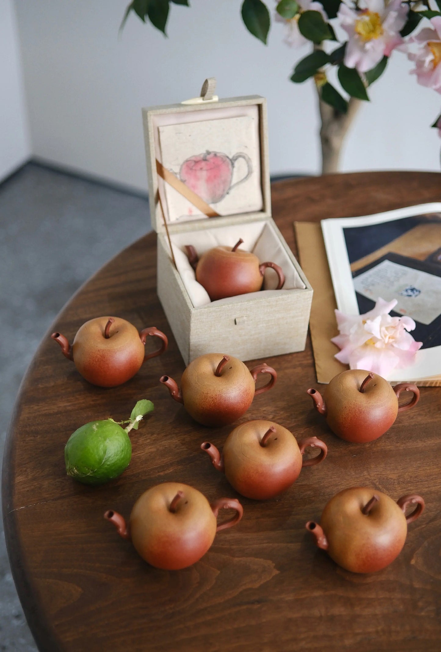 Apple-shaped Duanni teapot showcasing craftsmanship details