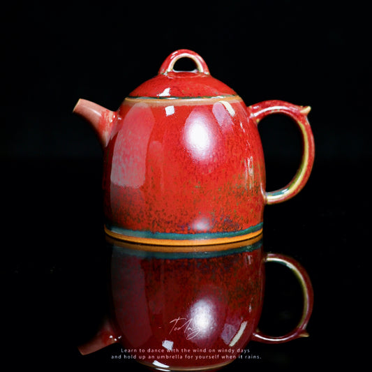 Handcrafted Jun Ware teapot in vermilion red glaze with Qinquan imperial weight silhouette