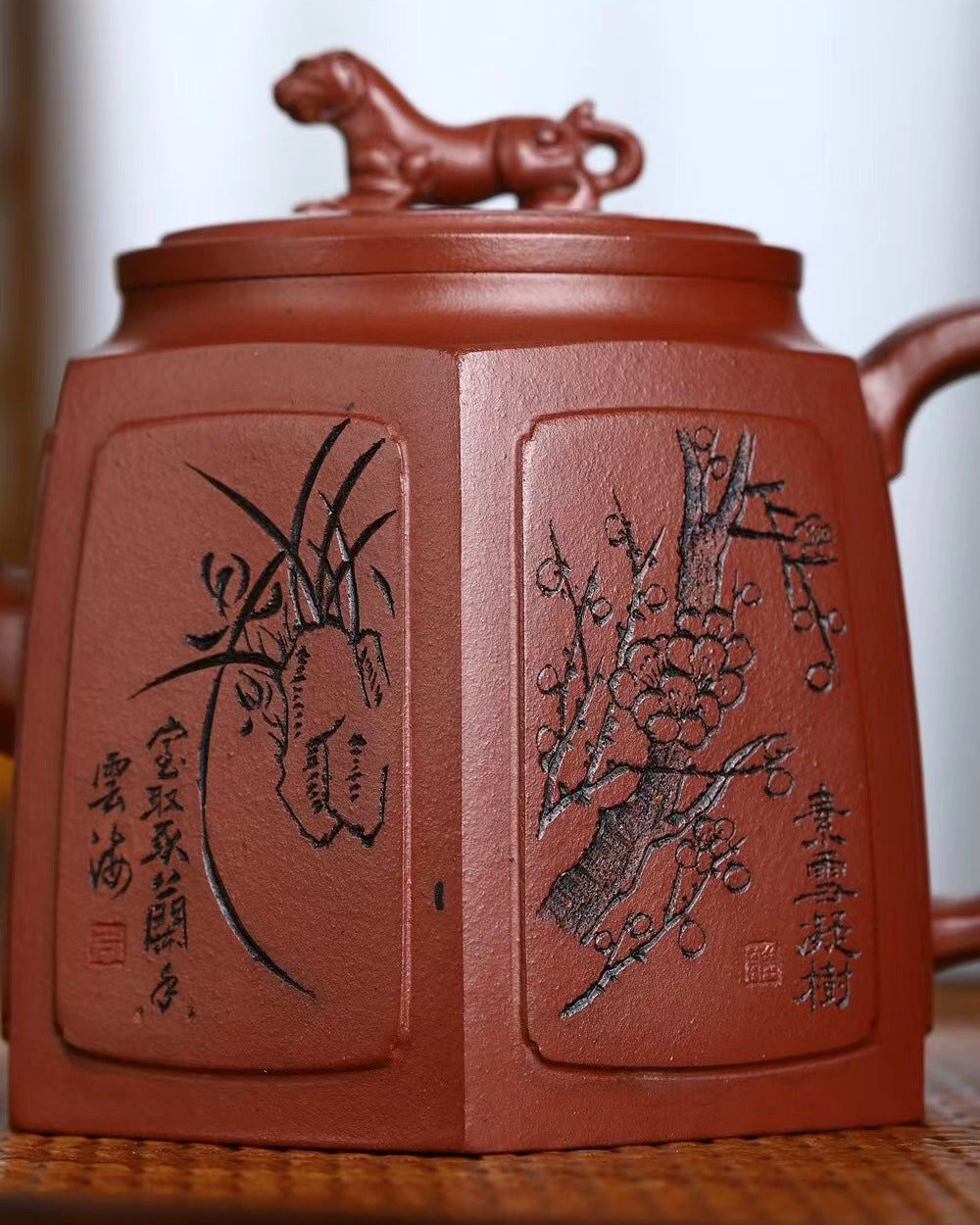 Artisan Yixing purple clay hexagonal teapot featuring Jaguar motif