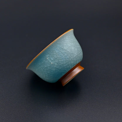 Song dynasty style teacup with agate-infused glaze creating unique sky-blue coloration