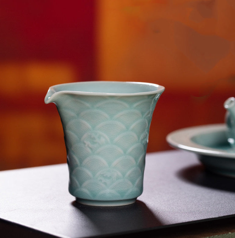 Handmade master-grade Longquan Celadon tea collection showcasing imperial dragon motifs in presentation box