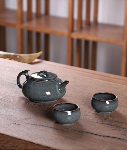 Longquan Celadon iron clay and crackle glaze teapot set in dark green color