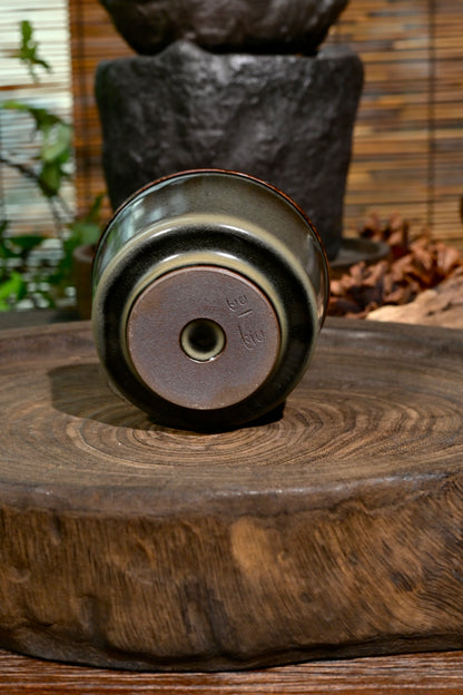 Ergonomic 120ml celadon master teacup with mossy olive glaze gradient designed for Gongfu tea
