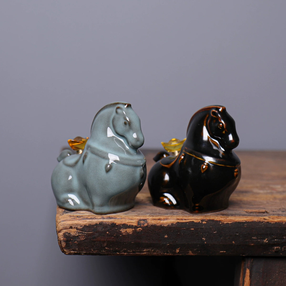Classical Chinese porcelain horse figurine in plum green glaze built for tea seasoning