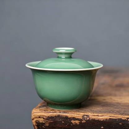 Ergonomic wide-flared celadon gaiwan rim designed for heat safety and smooth Gongfu tea pouring