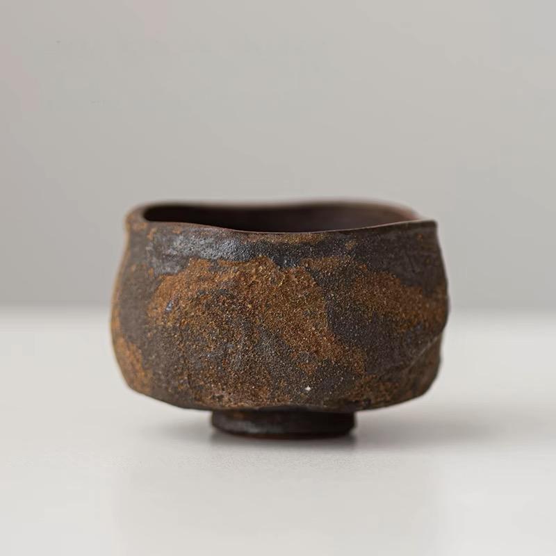Wood-fired wabi-sabi style japanese ceramic teacup unglazed