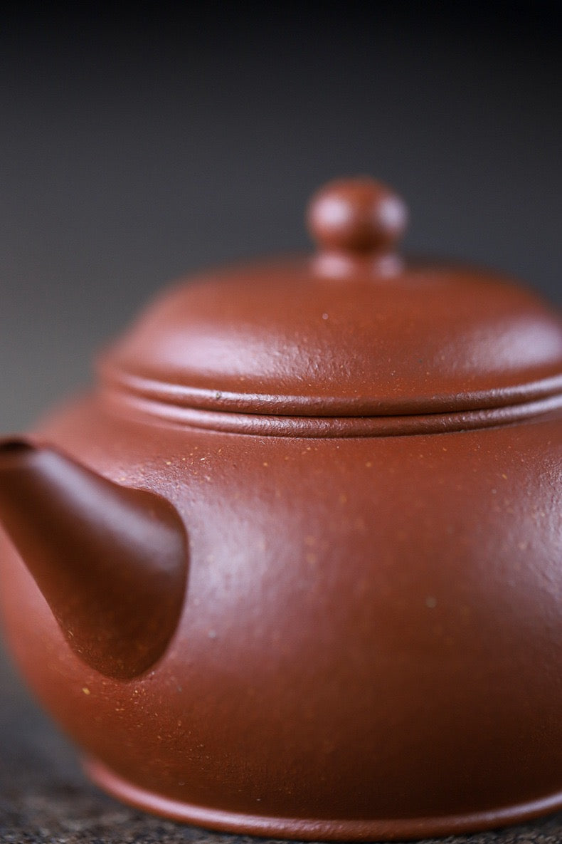Rare Jiangpo clay teapot with orange-red base color, becoming more valuable with tea brewing use