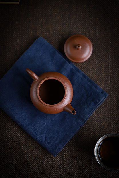 Yixing teapot from buried mine Jiangpo clay, refined to show aged orange-red hue with yellow tones