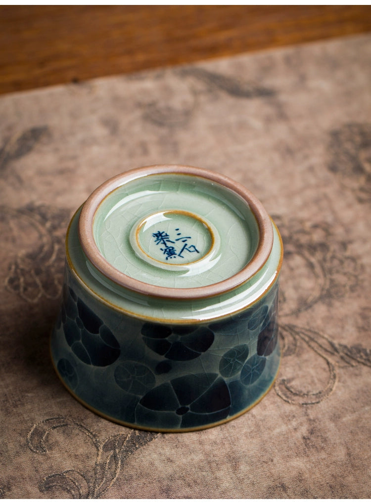Artisanal Jingdezhen blue and white underglaze porcelain tea cup.