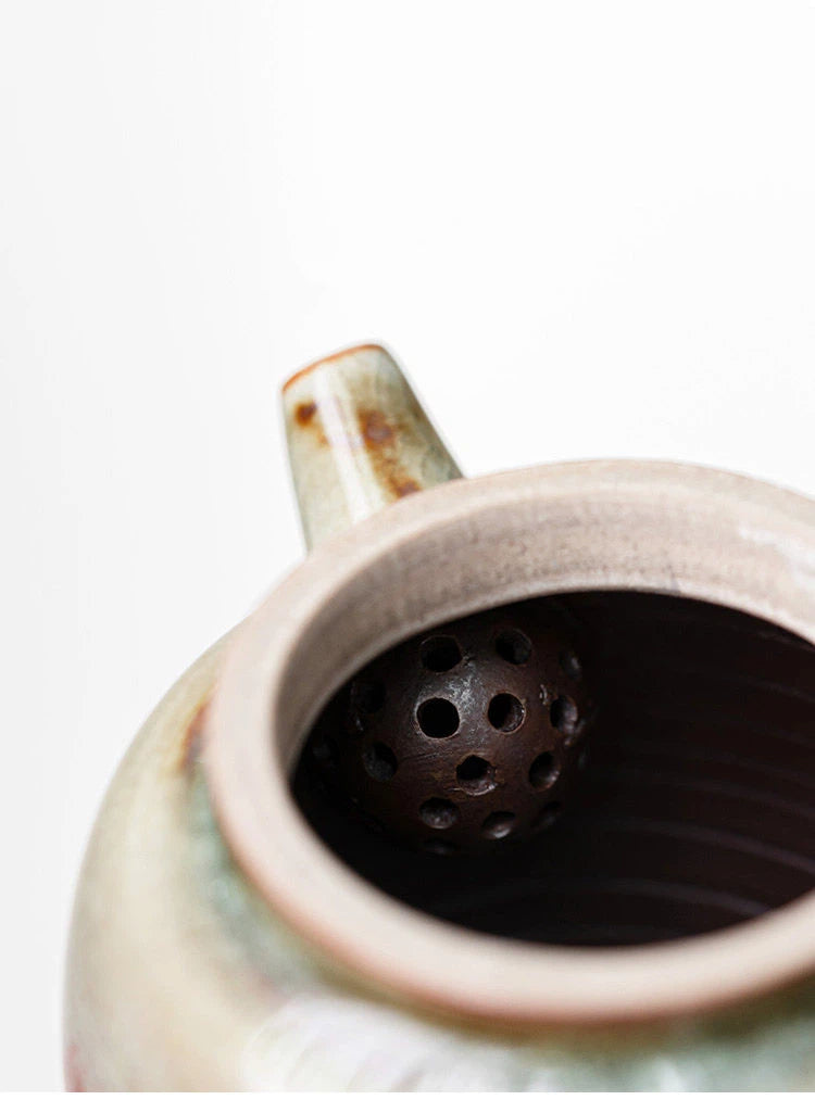 Traditional Chinese ceramic teapot fired in a wood kiln with rich copper-red glaze