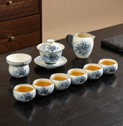 Jingdezhen Hand-Carved Blue and White Porcelain 11-Piece Gongfu Tea Set in a front studio shot.
