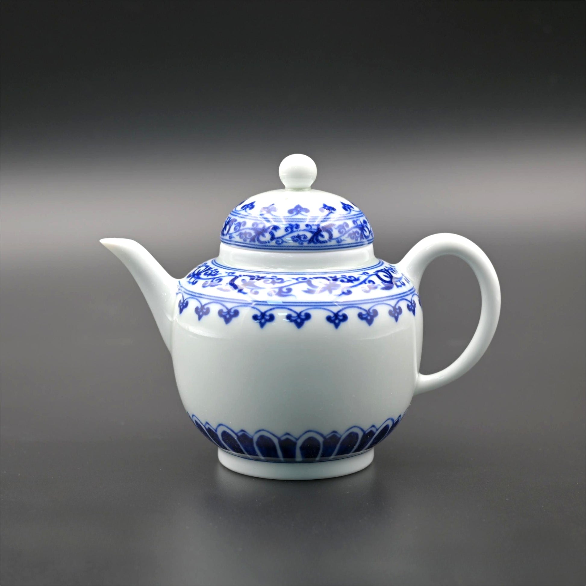 Jingdezhen underglaze blue and white teapot featuring traditional hand-painted cobalt decoration