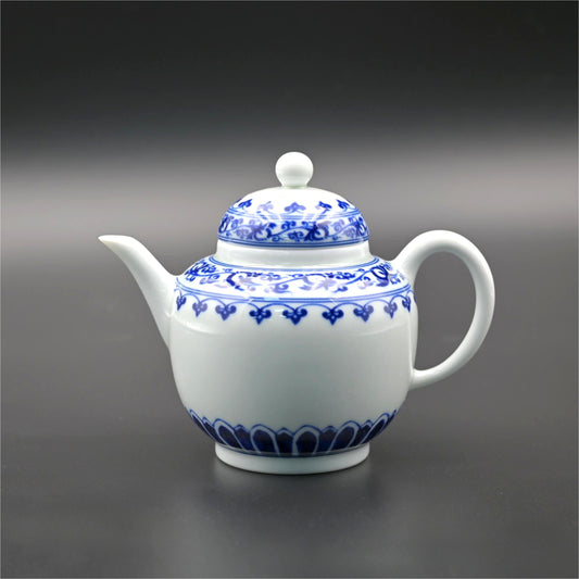 Jingdezhen underglaze blue and white teapot featuring traditional hand-painted cobalt decoration