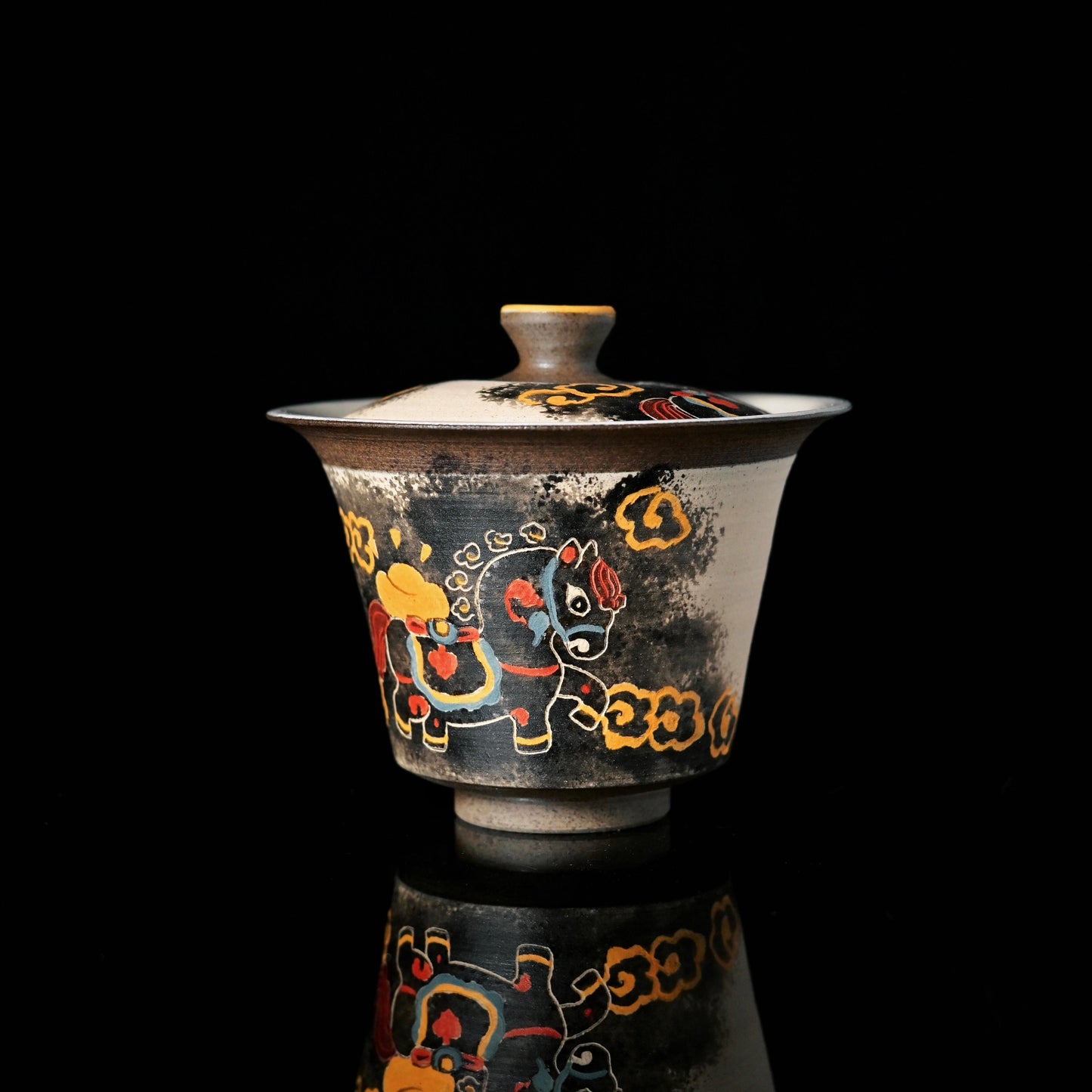Lidded bowl with hand-carved pony pattern
