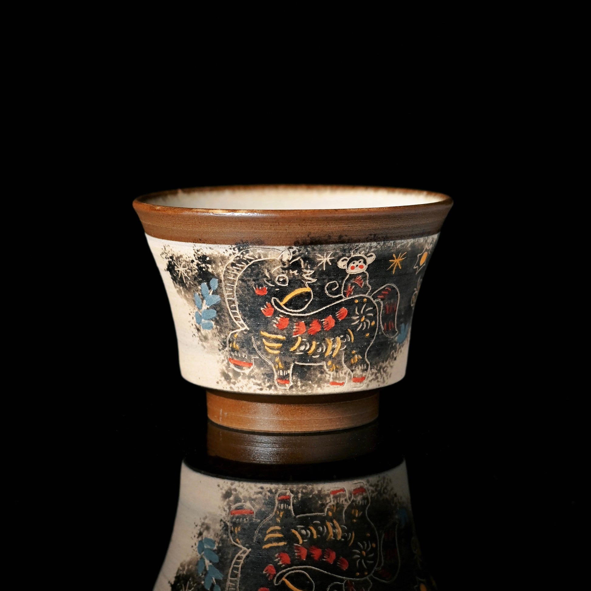 Hand-pulled ceramic teacup demonstrating traditional Jingdezhen forming technique with unique texture