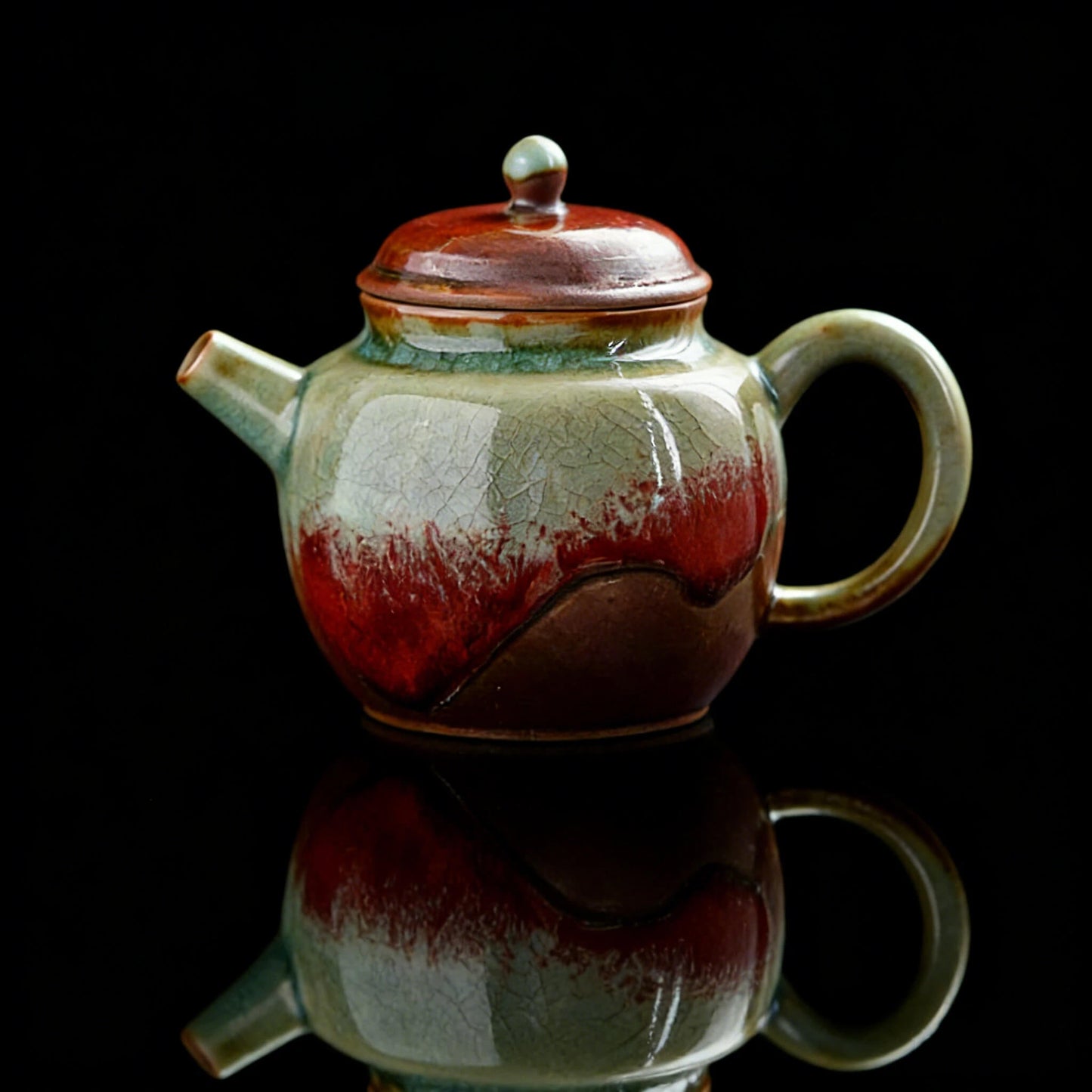 Unique Jingdezhen wood-fired teapot with underglaze red glaze shaped by natural kiln flames