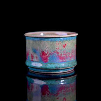 Handcrafted Jun ware teacup with magical green flambé glaze, horsehoof shape, and crackled texture for Chinese tea ceremony