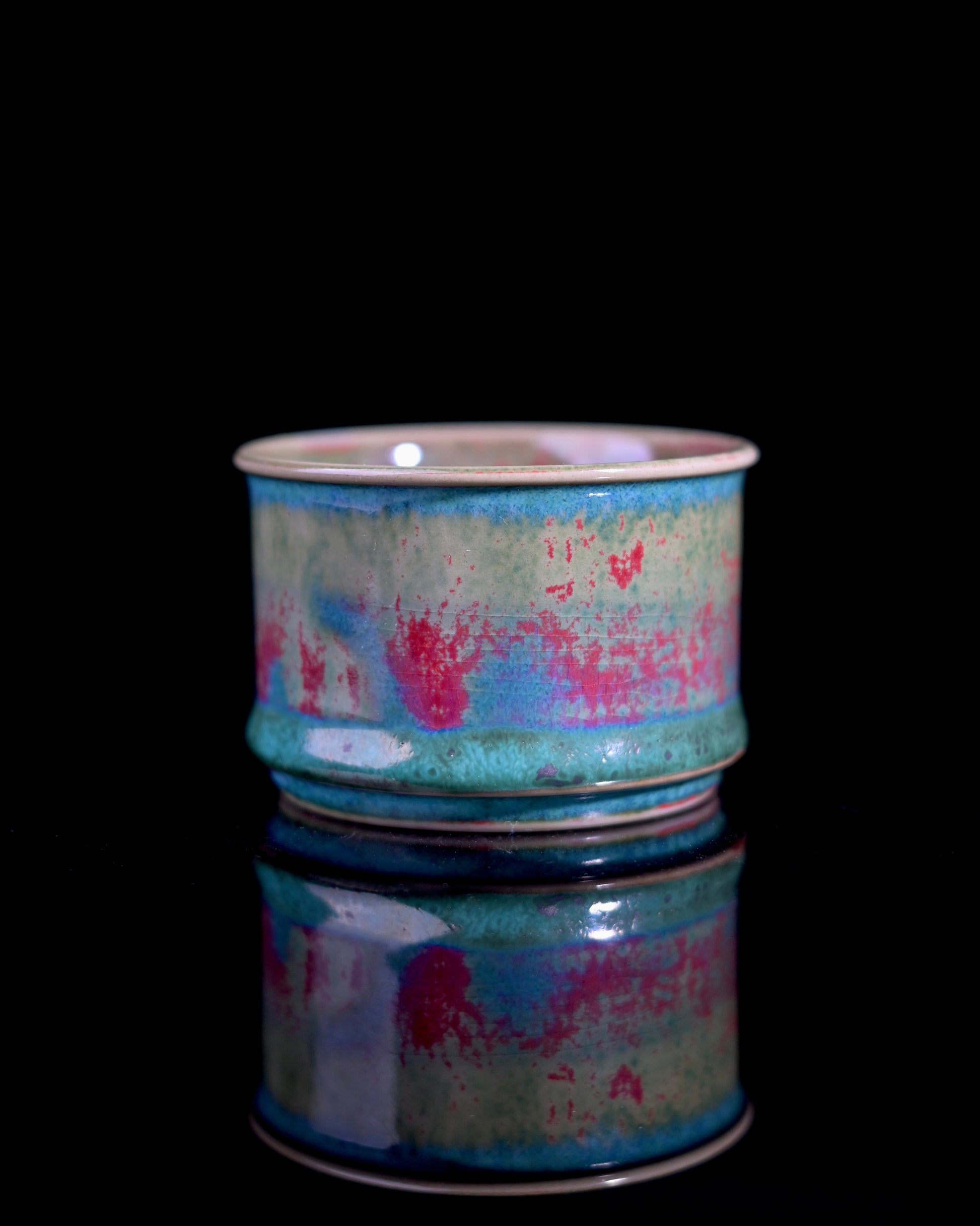 Handcrafted Jun ware teacup with magical green flambé glaze, horsehoof shape, and crackled texture for Chinese tea ceremony