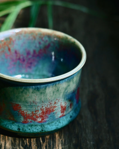 Handcrafted Jun ware teacup with magical green flambé glaze, horsehoof shape, and crackled texture for Chinese tea ceremony