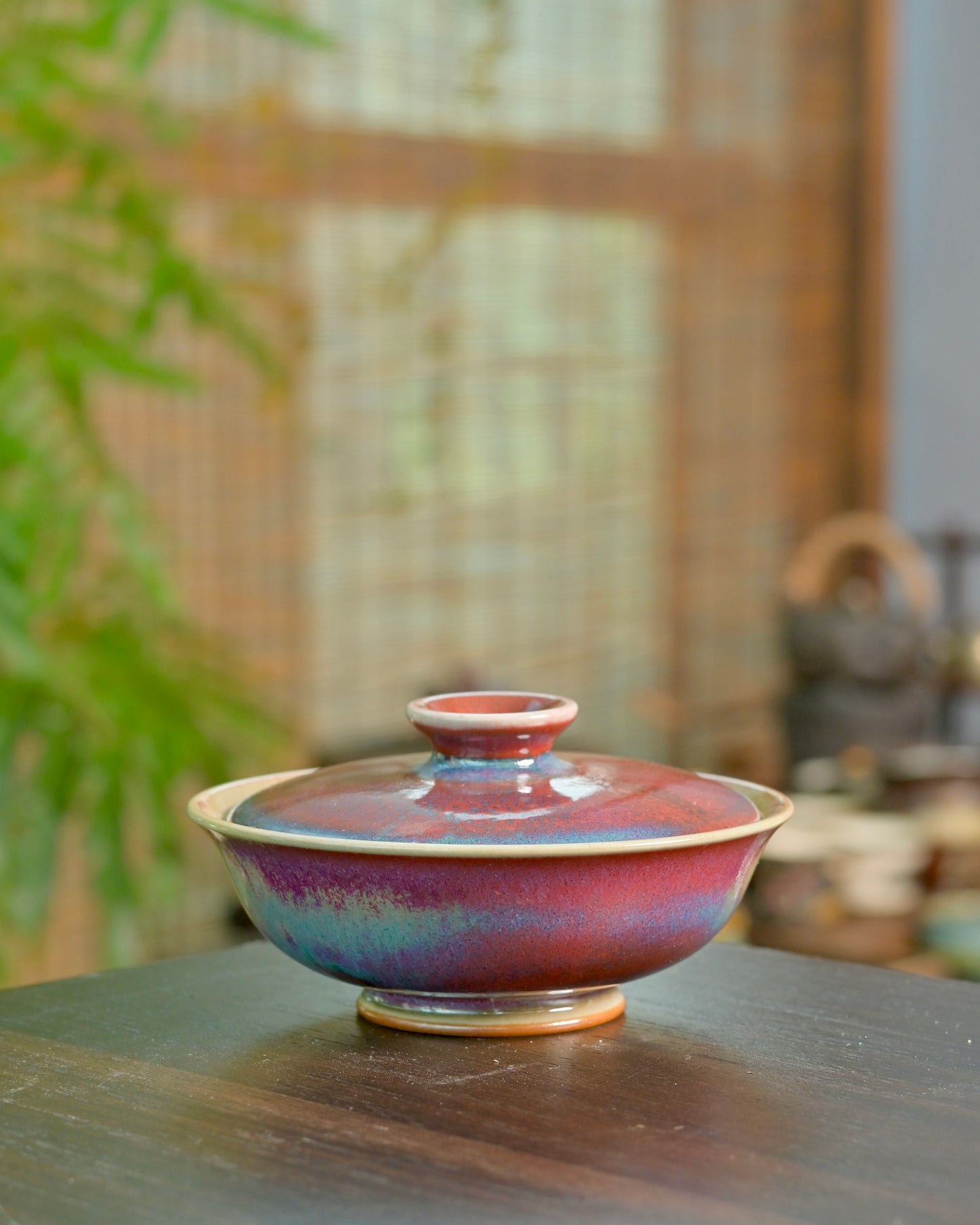Jun ware gaiwan lid with flowing copper-red and blue glaze effect