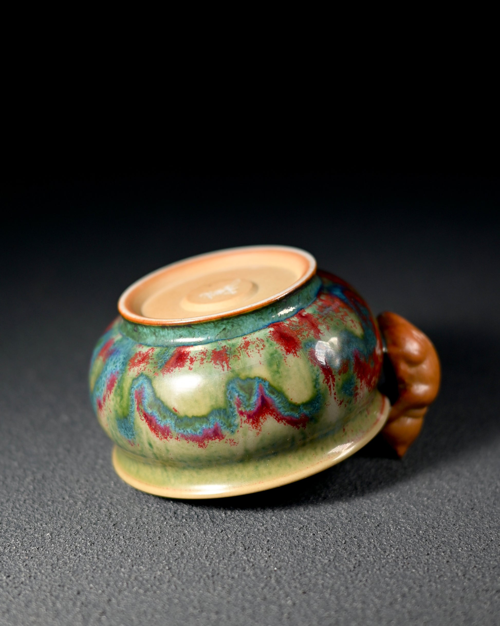 Hand-pinched irregular ceramic form demonstrating organic shaping technique and tactile beauty