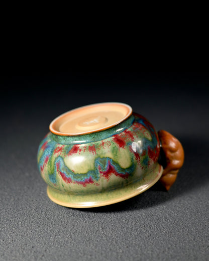 Hand-pinched irregular ceramic form demonstrating organic shaping technique and tactile beauty