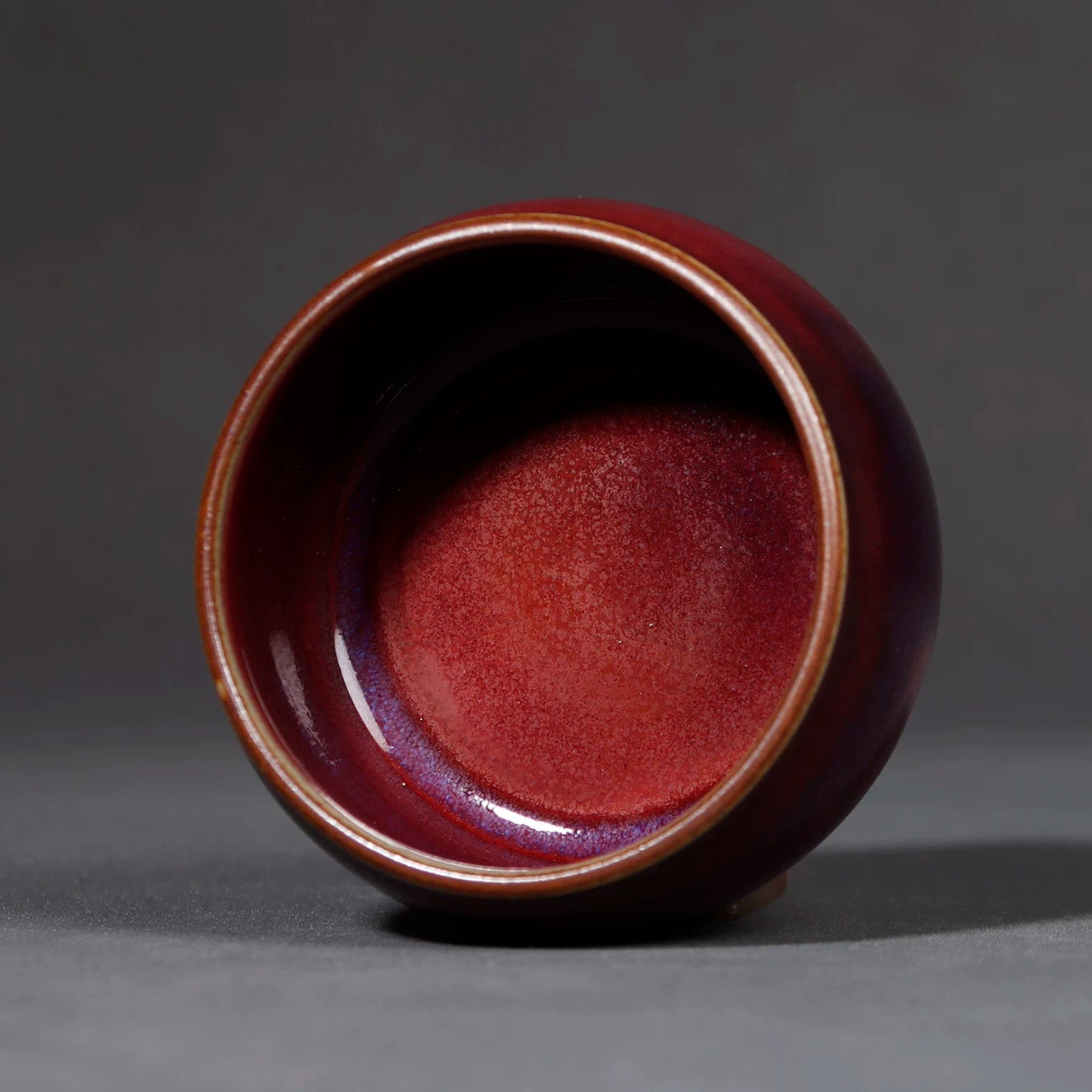 Top-down view into the teapot interior showcasing smooth glaze coverage and wide mouth.