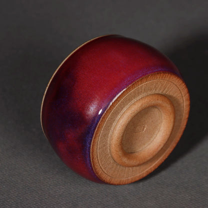 Top-down view into the teapot interior showcasing smooth glaze coverage and wide mouth.