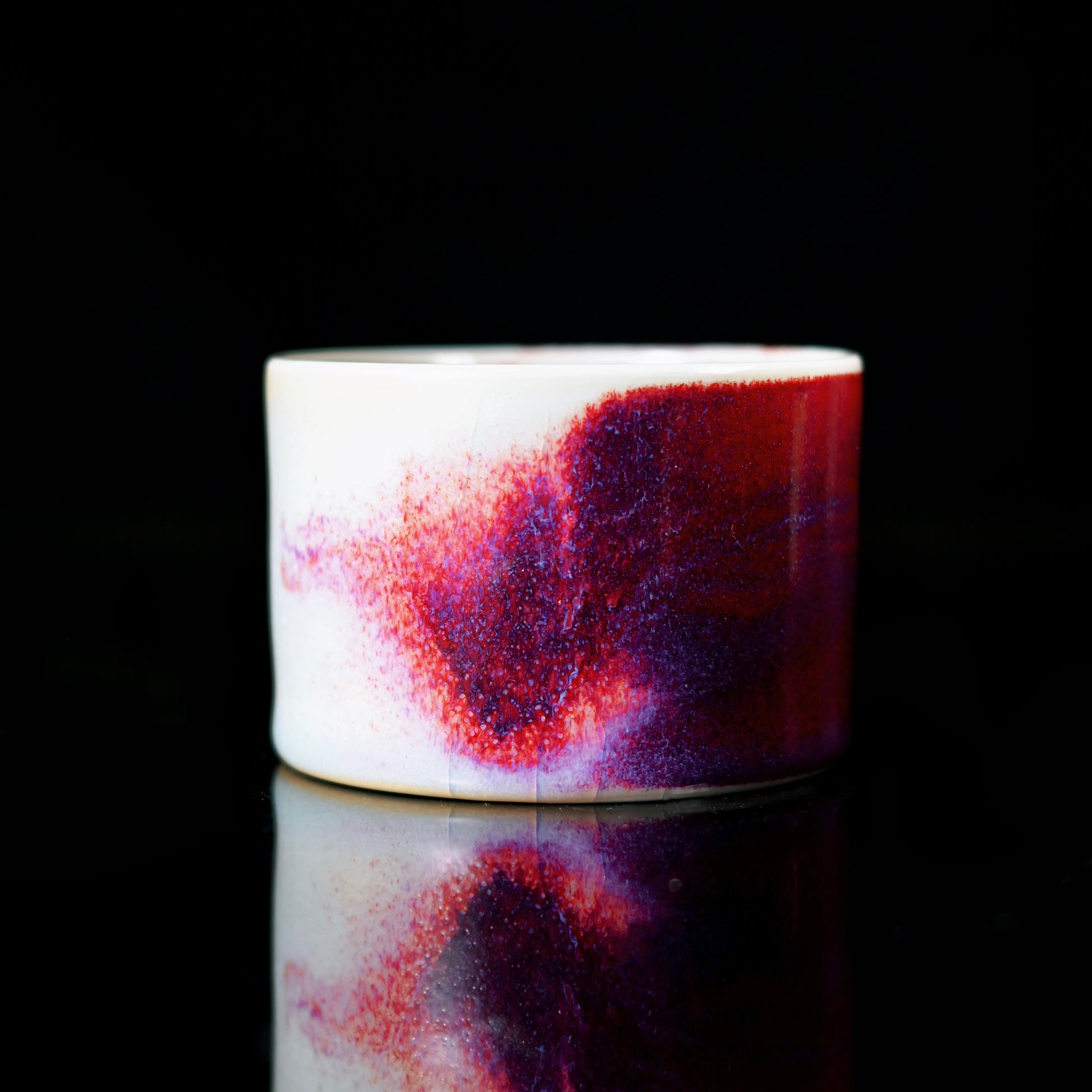 Jun ware color flow patterns formed by natural mineral movement during kiln cooling process