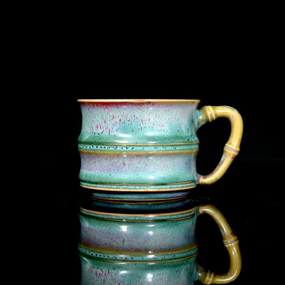 Handcrafted Jun Ware 180ml mug by Li Panlong with peacock green glaze and sculpted bamboo-joint body