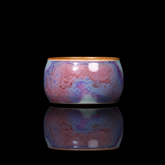 Jun Ware Starry Galaxy Violet Handcrafted Teacup 110ML studio shot highlighting its celestial violet glaze and natural kiln transformation.