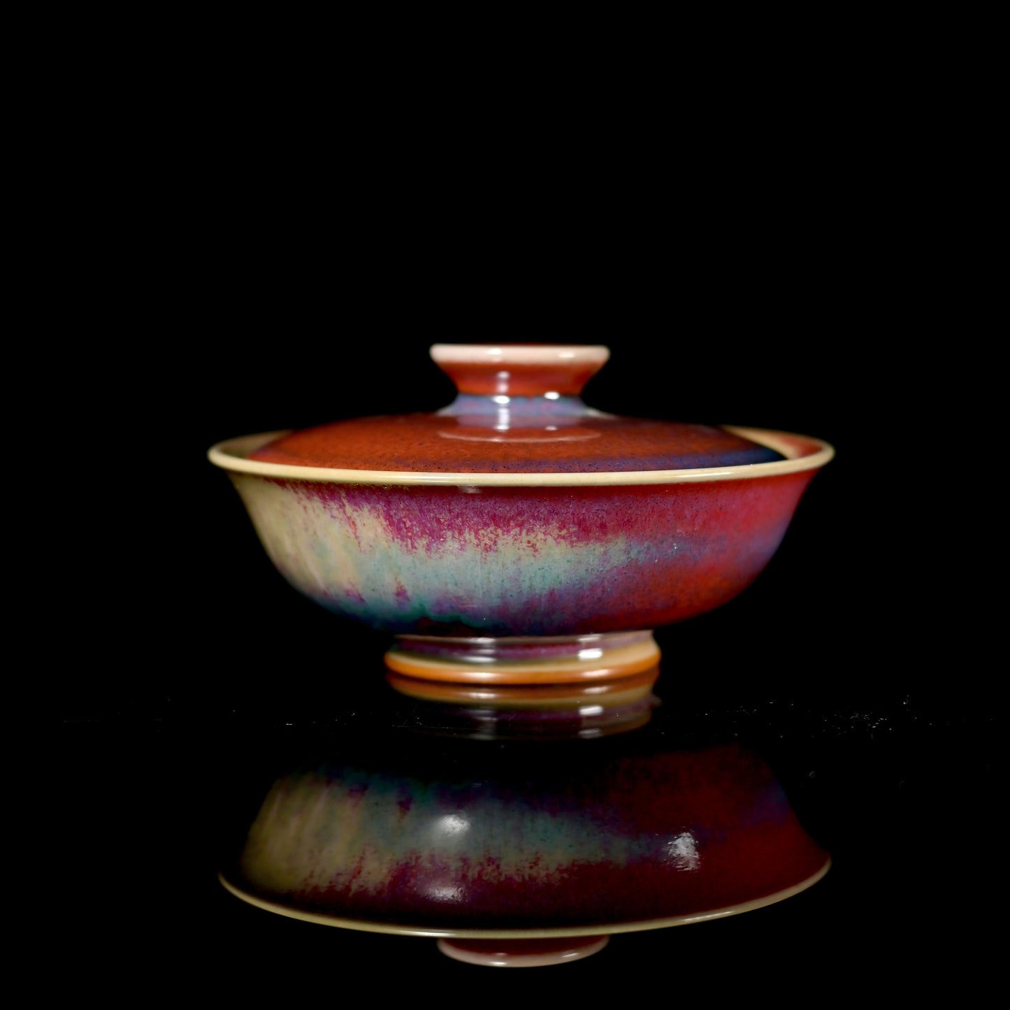 Jun ware wide-rim gaiwan with kiln-transformed red, purple, and blue glaze