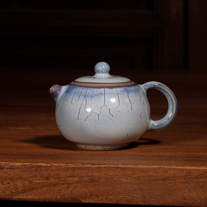 100ml Jun kiln Xishi teapot, ideal capacity for solo Gongfu tea brewing sessions.