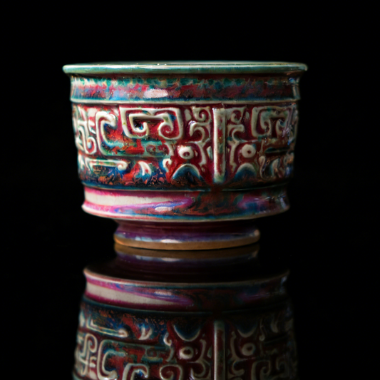 Handmade Jun Kiln flambé glaze teacup with embossed bronze pattern exterior