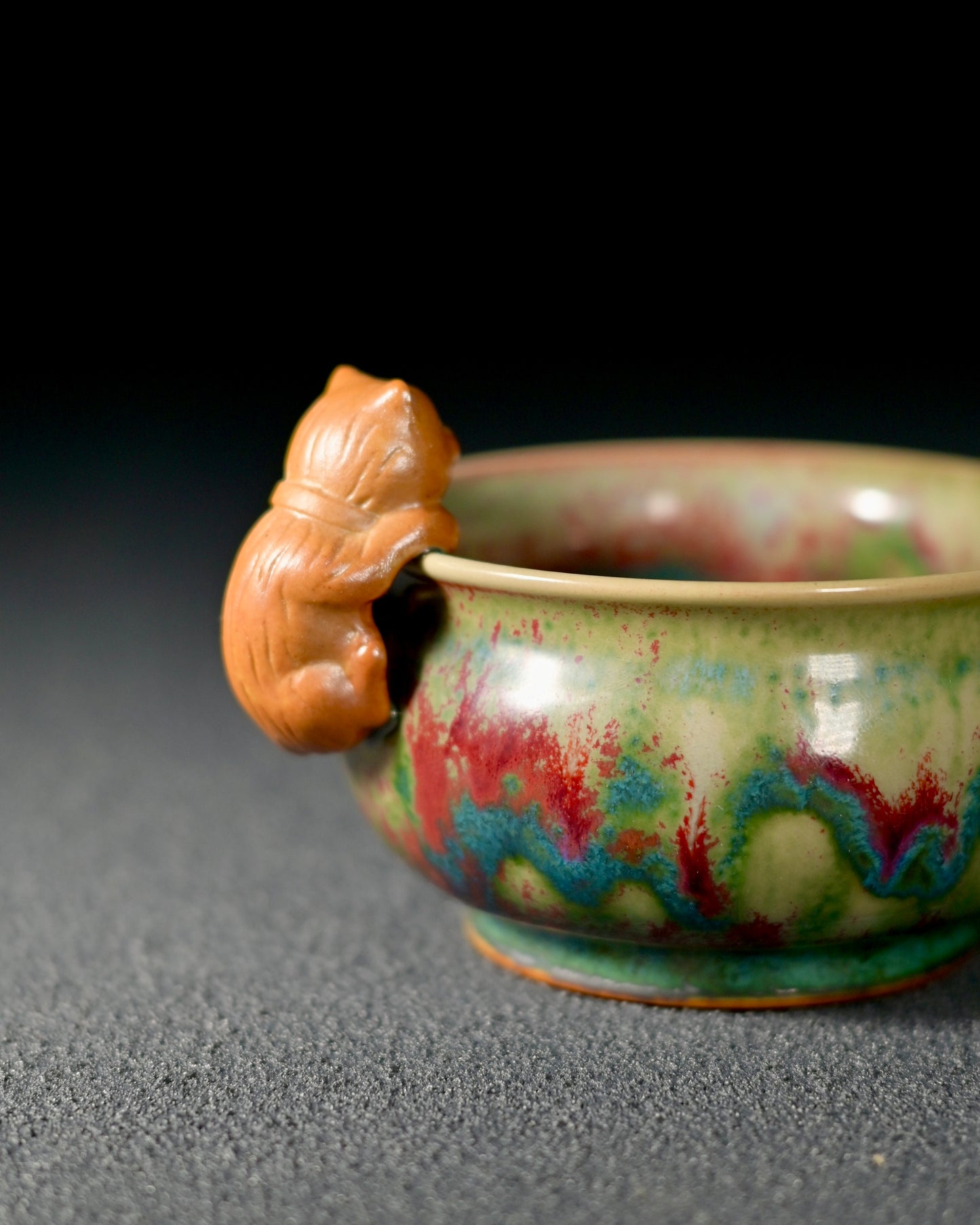 Copper-iron multicolor glaze creating unrepeatable patterns through high-temperature firing in Jun Kiln