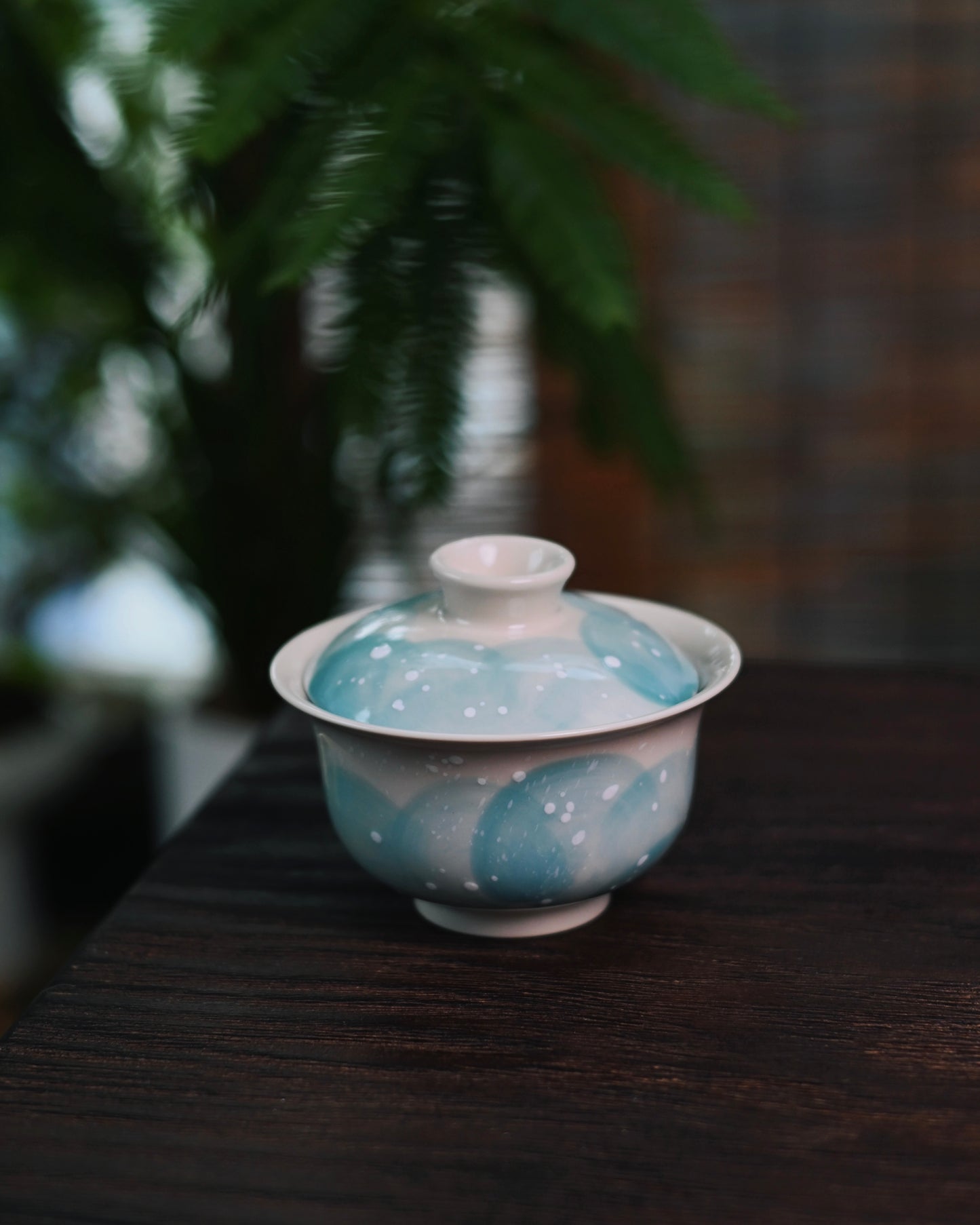 Kaolin clay body in creamy beige tone that contrasts beautifully with cool blue underglaze painting