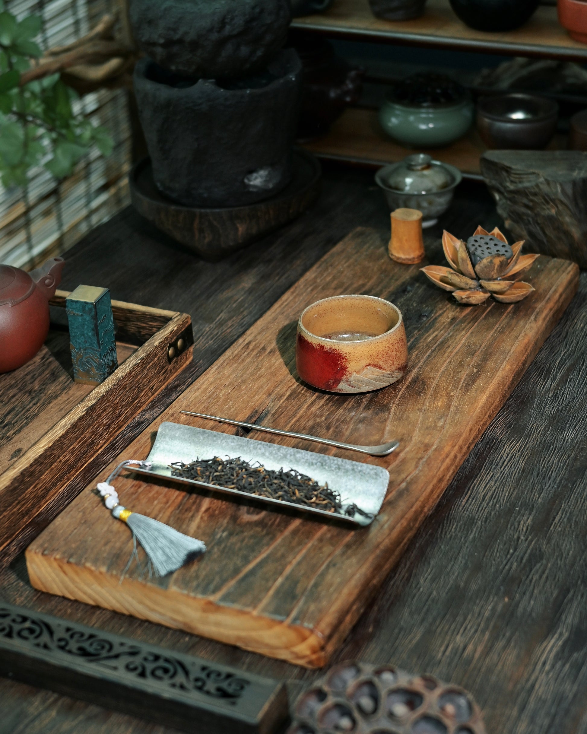 Kiln transformation coloration where copper and iron elements create unpredictable glaze effects

