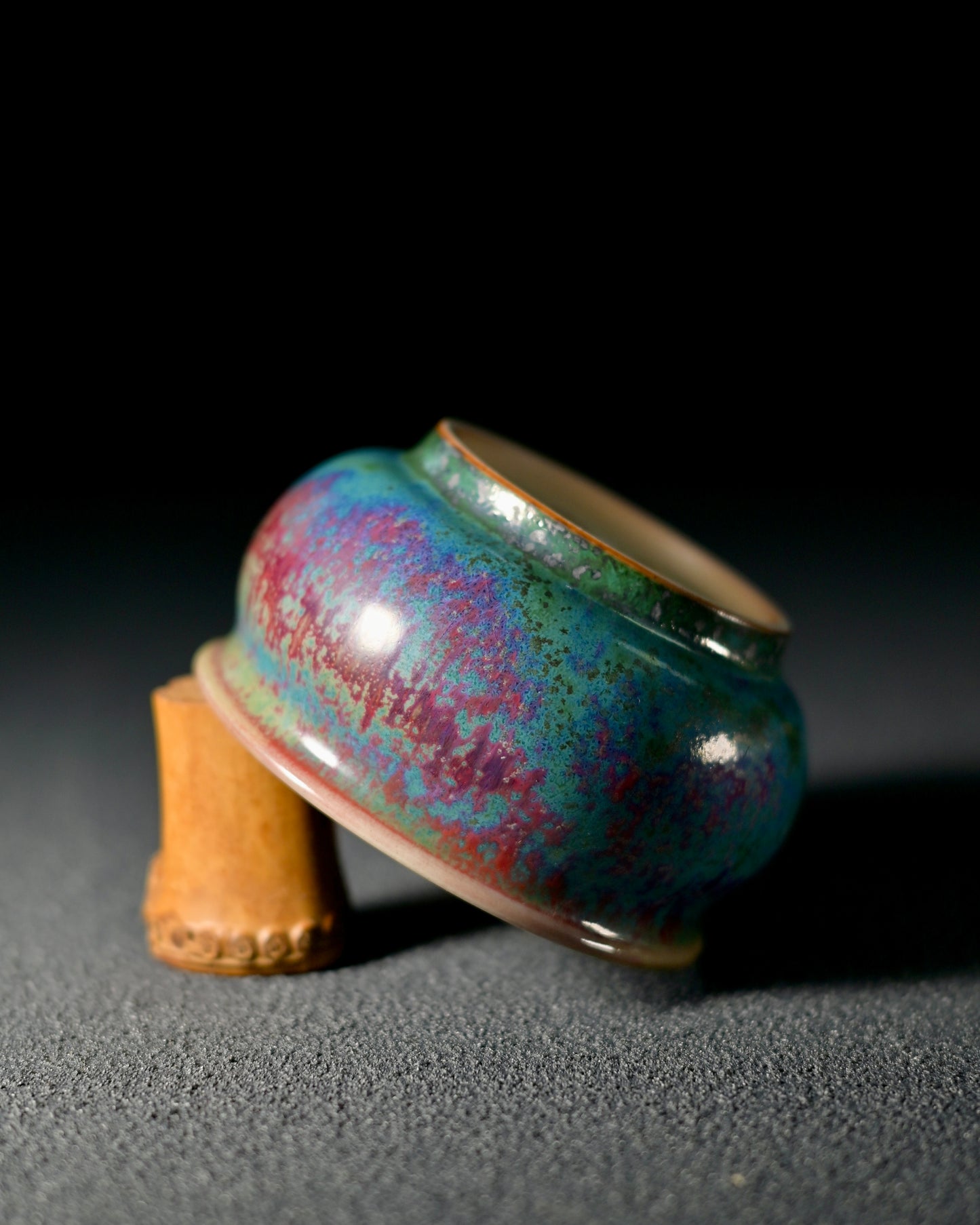 Jun kiln transformation galaxy glaze showing spontaneous color fusion resembling cosmic nebulae