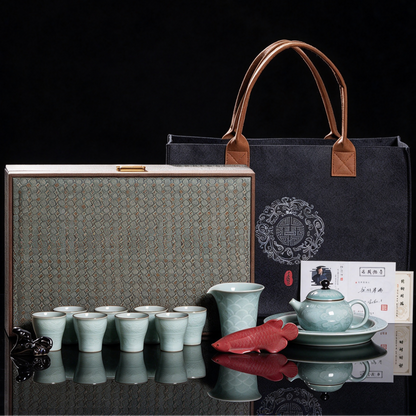 Flagship Longquan Celadon Auspicious Dragon 12-piece luxury tea set displayed with silk-lined brocade gift trunk