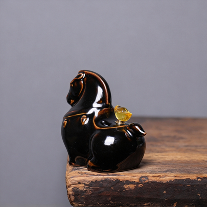 Artisanal Longquan Celadon horse tea pet designed for tea nourishment and desk decor