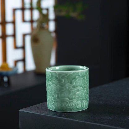 Sip serenity and style with the handcrafted Longquan Celadon Cloud Cup.