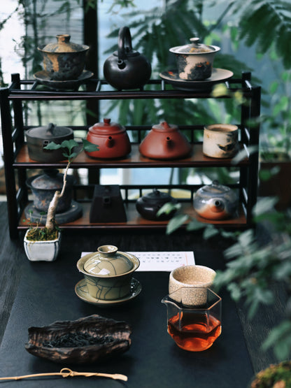 Ge Kiln-inspired horseshoe gaiwan: Longquan celadon with golden crackle networks on beige glaze, traditional iron clay body, and optimized shape for quick tea preparation.