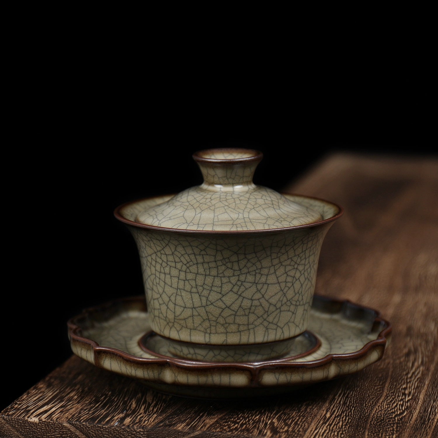 Traditional Longquan celadon GE ware three-piece gaiwan, meticulously handcrafted for authentic Chinese tea brewing and elegant display.
