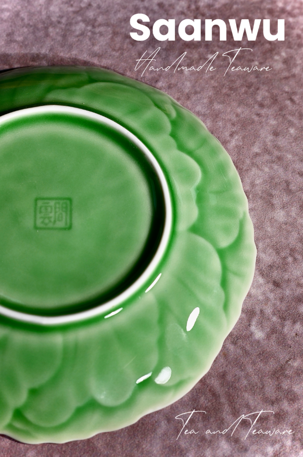 Bottom view showing the neatly finished unglazed foot ring of a handcrafted Longquan Celadon tea saucer.