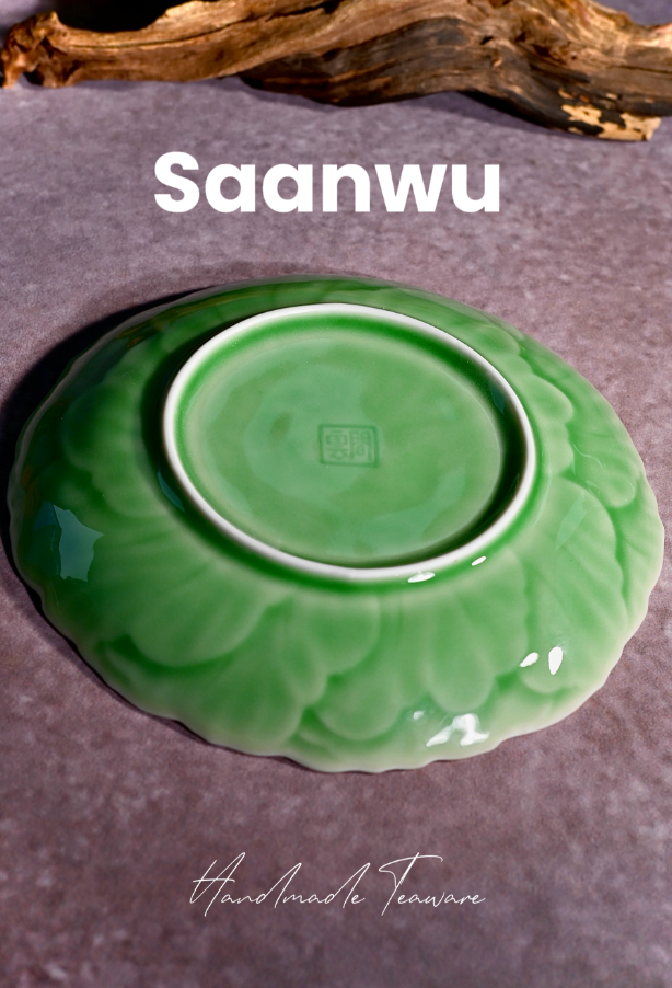 Bottom view showing the neatly finished unglazed foot ring of a handcrafted Longquan Celadon tea saucer.