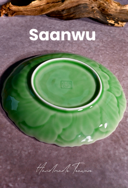 Bottom view showing the neatly finished unglazed foot ring of a handcrafted Longquan Celadon tea saucer.