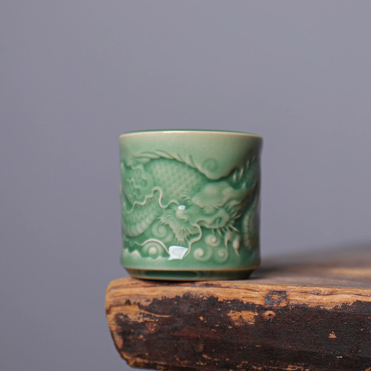Authentic imperial style Longquan Celadon porcelain teacup with 3D carved dragon relief